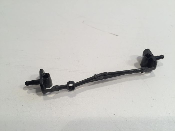 Axe roue avant pièce détachée miniature Chevrolet Corvette 1957 1/24 burago #A17