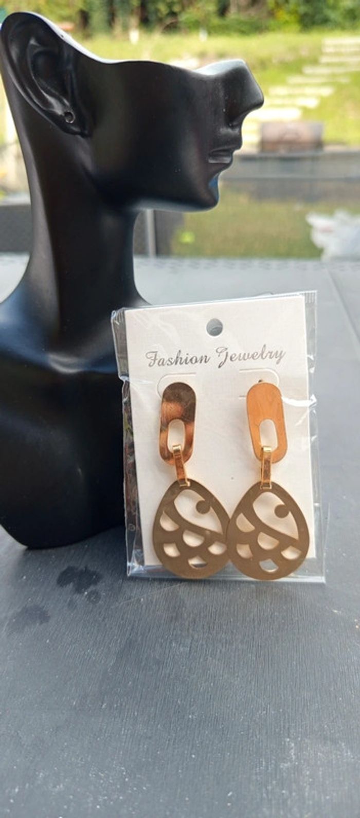 Boucles d'oreilles ovales a motifs femme - photo numéro 2