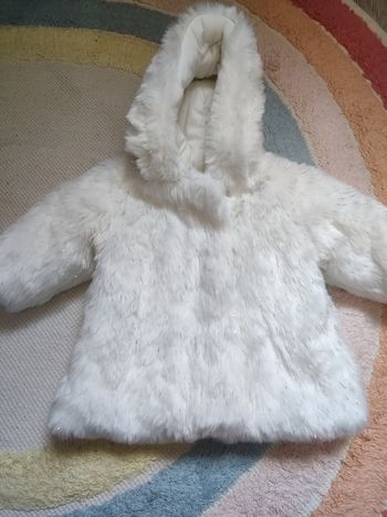 Manteau fausse fourrure 