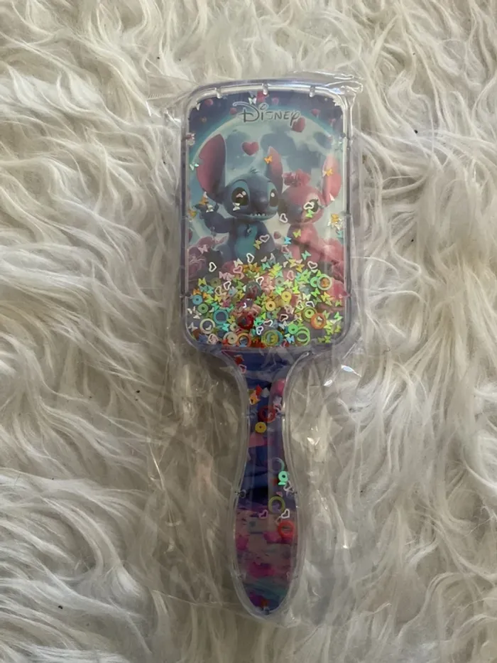Brosse à cheveux stitch neuve