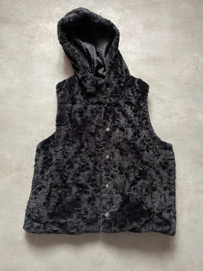 Veste sans manche cache cache