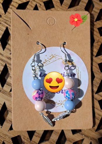 Boucles d'oreilles plume argentée