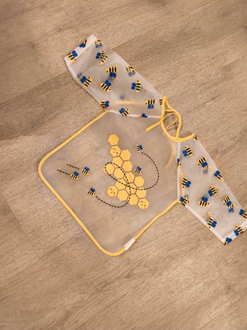 Bavoir tablier manches longues abeille PVC plastique fermeture lacets Mots d'enfants  DME