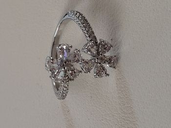 Bague ouverte acier inoxydable argenté avec fleurs zircon blanc