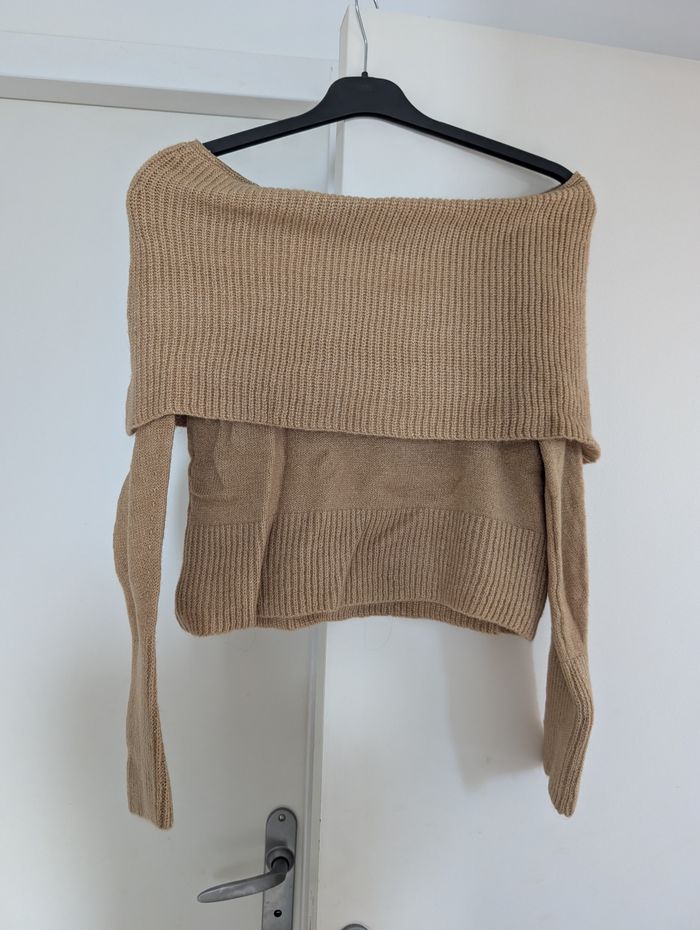 Pull épaule dénudé