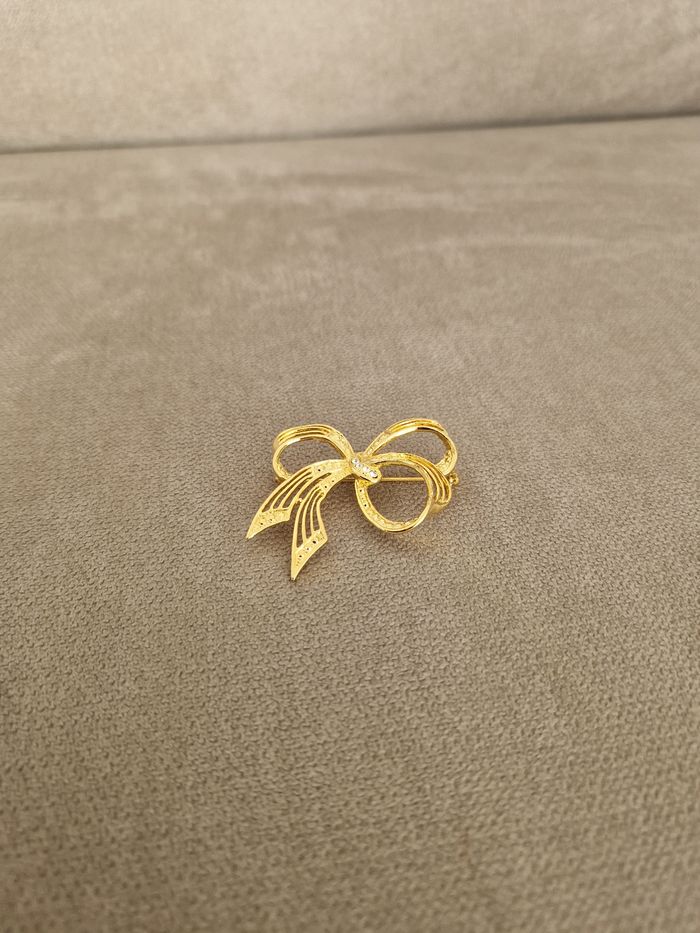 Broche noeud vintage dorée