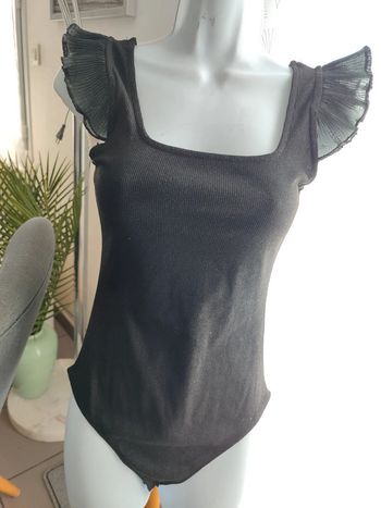 Joli body noir pailleté