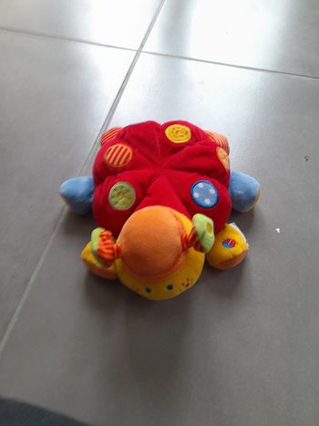 Peluche coccinelle motricité