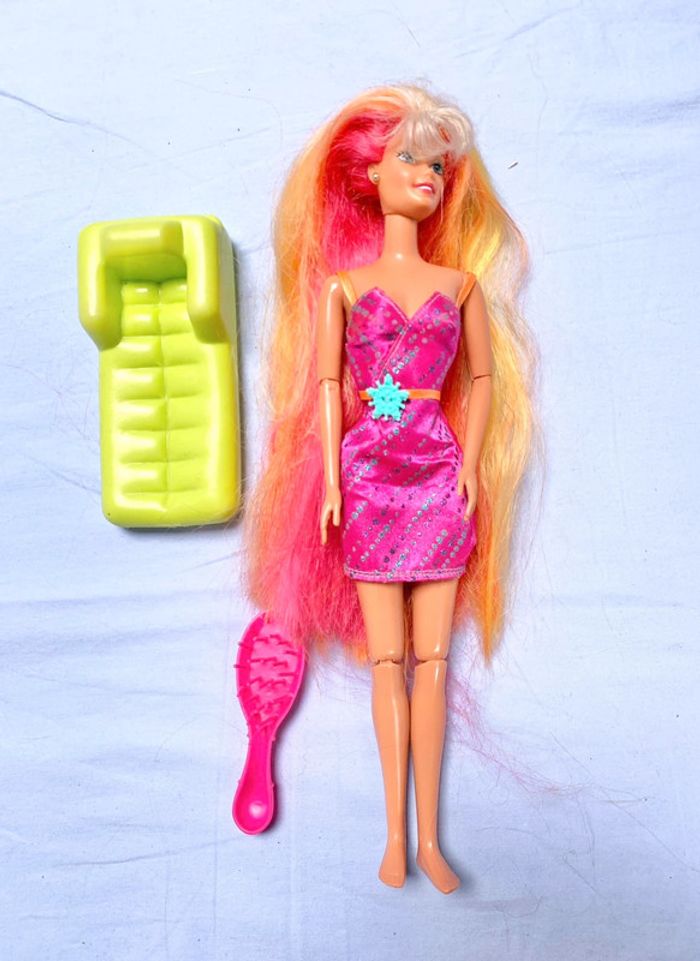 Poupée barbie hula hair