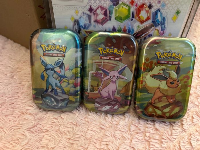 3 mini tin évolution prismatiques