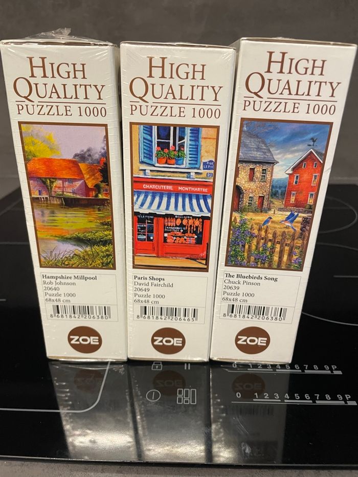 Lot 3 puzzles neufs - photo numéro 2