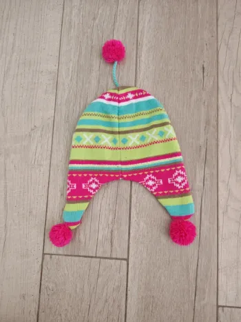 Bonnet péruvien rose à pom-pom