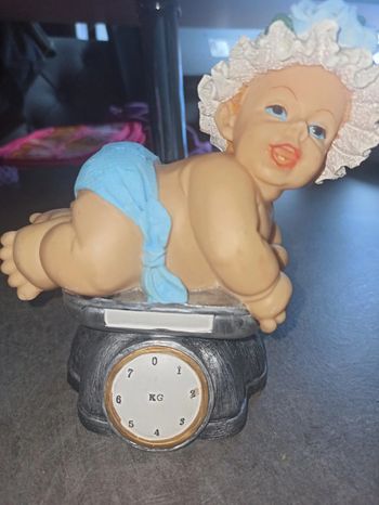 Tirelire bébé balance