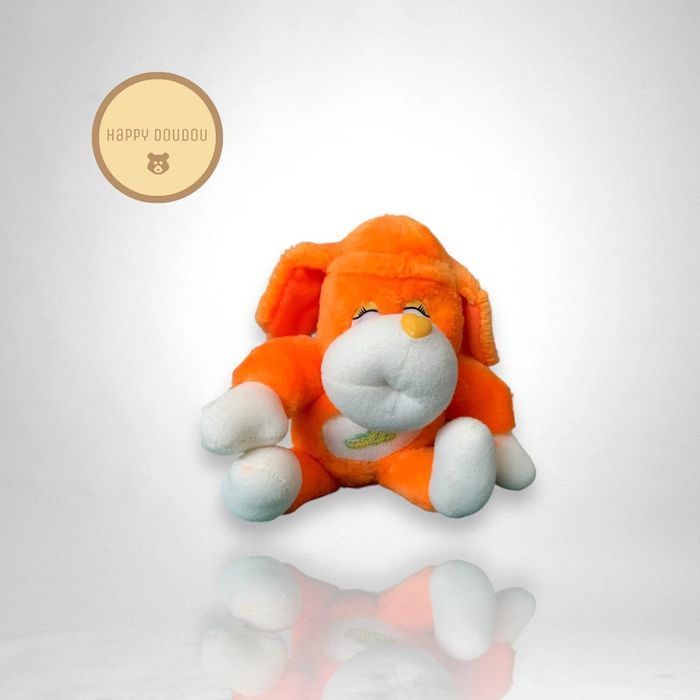 Peluche Doudou singe chien orange banane CP A619