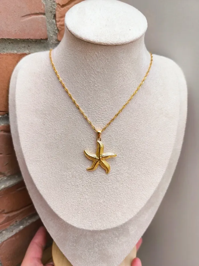 Collier doré chaîne torsadée avec étoile de mer