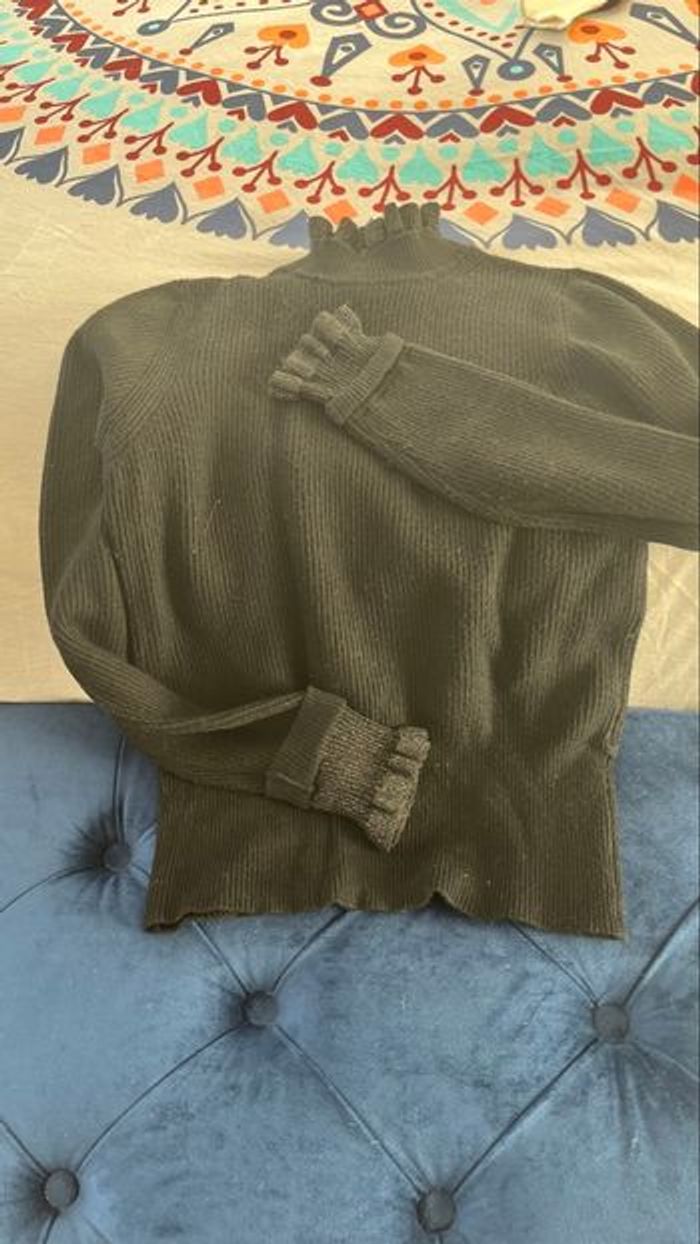 Pull femme noir argenté bords col et manches