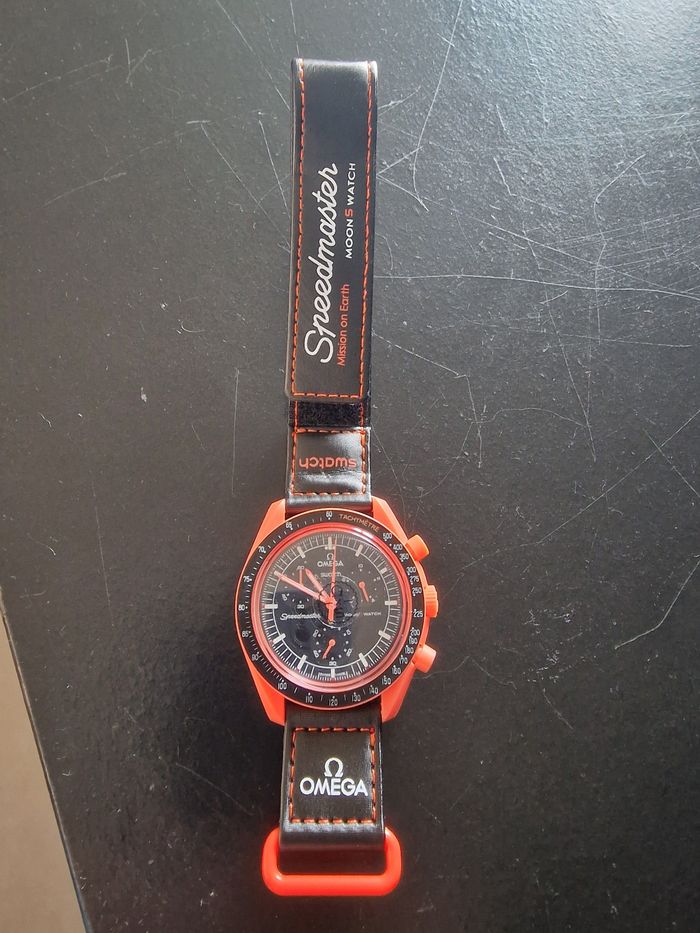 Montre omega swatch