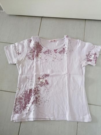 Tee-shirt porté une ou deux fois comme neuf taille M
