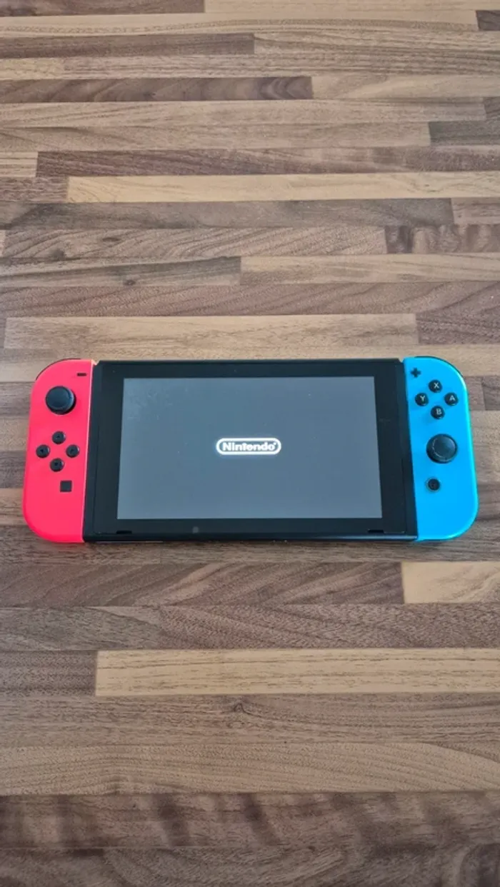 Console Nintendo switch en boîte - photo numéro 7
