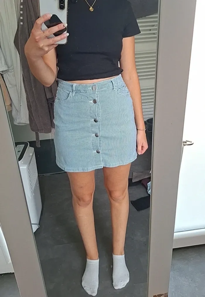 Jupe courte boutons