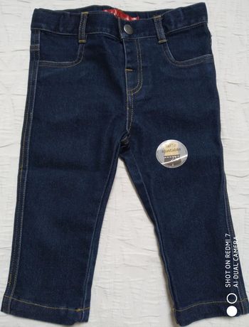 Tissaia Jean bleu brut neuf 12 mois mixte