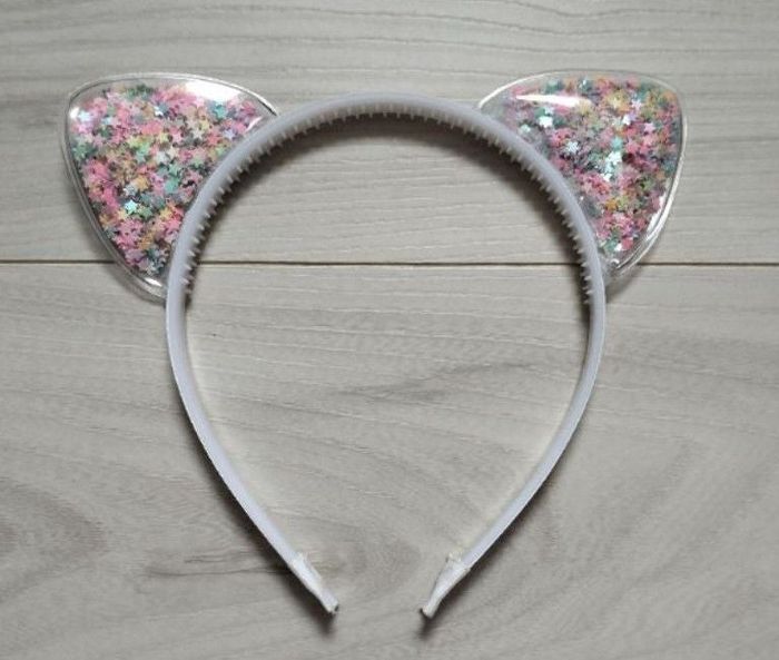 Serre tête à oreilles pailletées