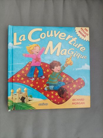 Joli livre pop up " la couverture magique"