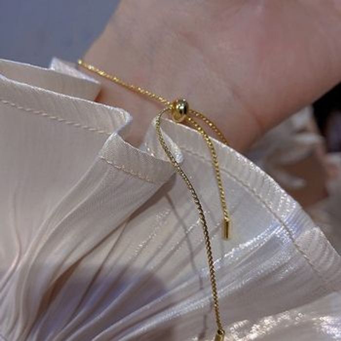 Rare bracelet en zircone plaqué or 18 carats - photo numéro 2