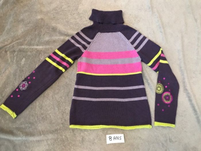 Pull col roulé