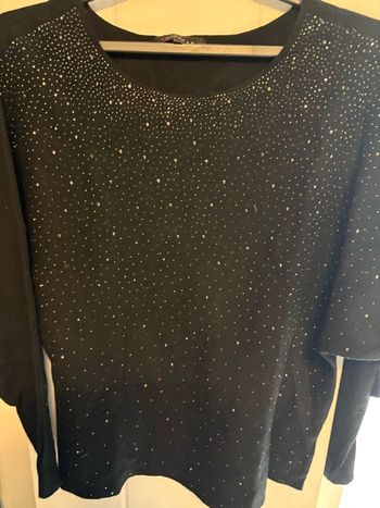 Pull ras de cou noir à sequins 