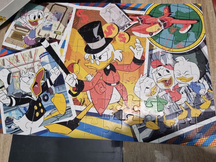 Puzzle complet 104 pièces duck tales avec boite abimée - photo numéro 6