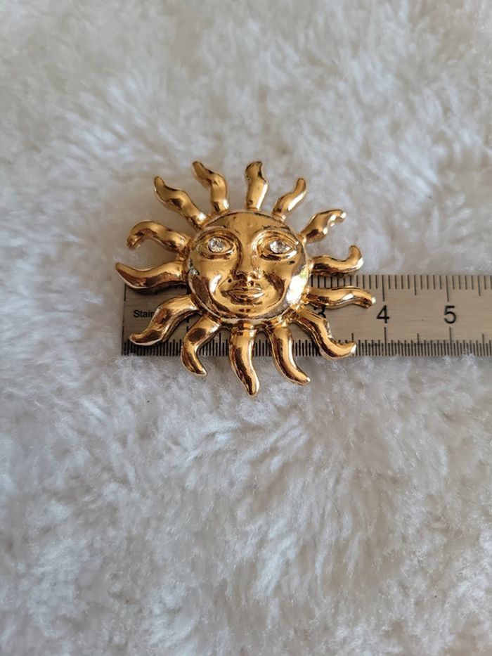 Broche soleil yeux zirconiums - photo numéro 2
