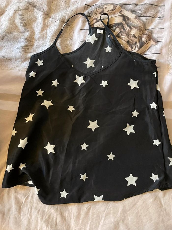 Débardeur péplum noir étoiles