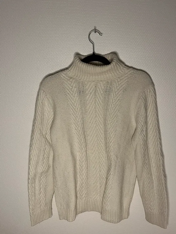 Pull col roulé