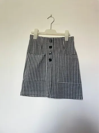 Mini-jupe à carreaux noir et blanc