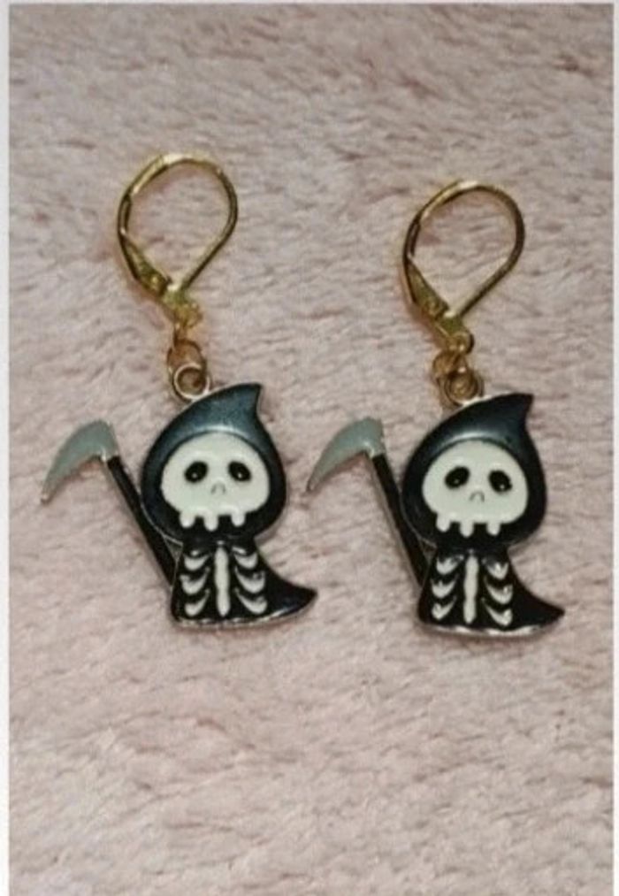 Boucles d'oreilles faucheuse