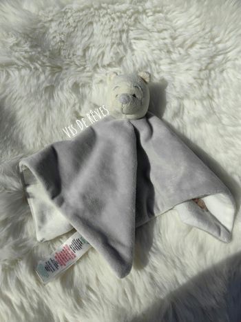 Doudou Winnie L'ourson jaune clair et gris Disney
