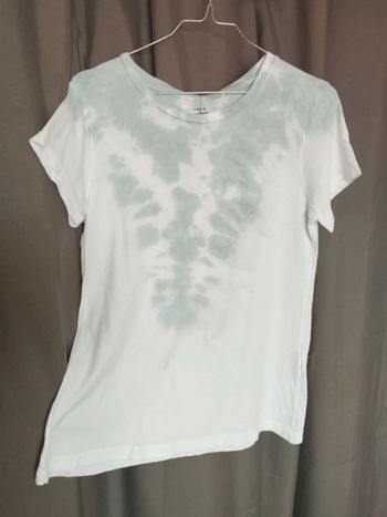 Tee-shirt . Marque system action.