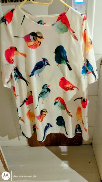 tunique décorée avec des oiseaux