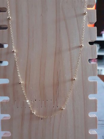 Collier doré des boules
