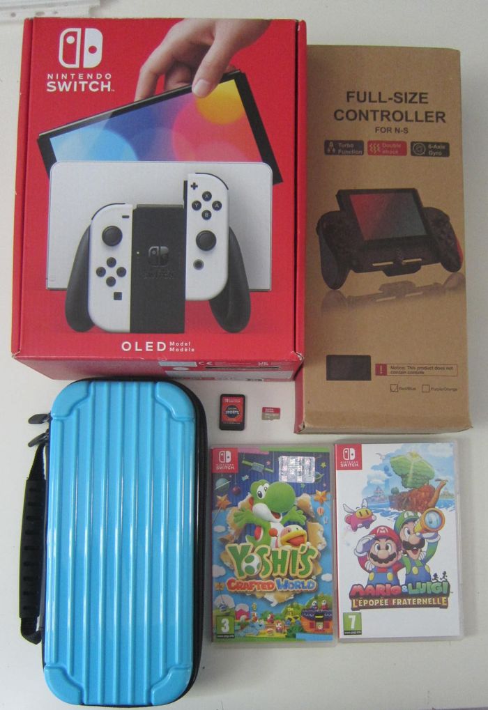 nintendo switch oled +256go sacoche manette pro yoshi crafted mario & luigi looney tunes