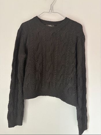 Pull noir tressé