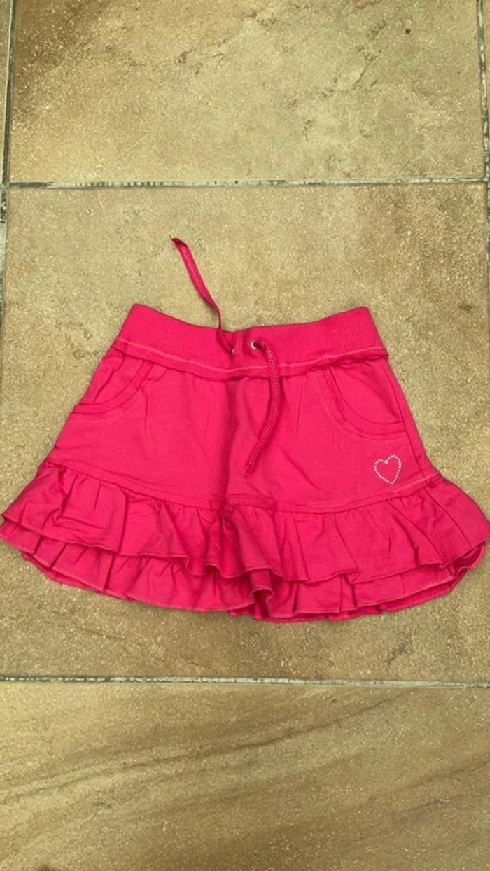 Mini-jupe à volants rose Neuve 8 ans (n°6)
