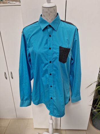 Chemise Bi Matière Bleu Avec Poche Et Details Noirs Et Gris