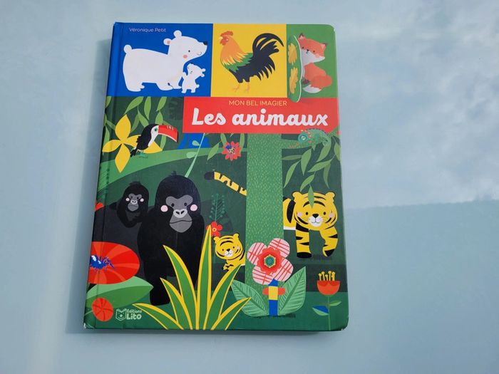 Grand livre à flaps 🦍 Mon Bel Imagier 🦜 Les animaux 🐆 73 - photo numéro 2