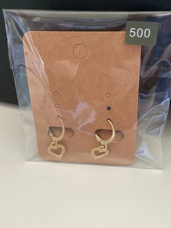 Boucles d’oreilles dorées petit cœur pendant