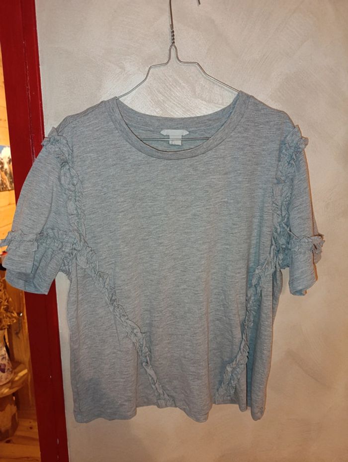 Superbe haut H et M taille L soit 42/44 - photo numéro 2