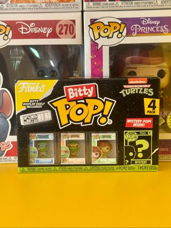 Funko Bitty Pop! 4 Pack - Nickelodeon Teenage Mutant Ninja Turtles - Leonardo, Michelangelo, April O’Neil & Bitty Pop! Mystery