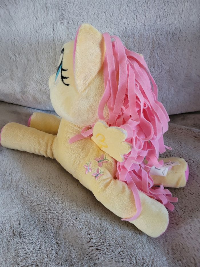 Peluche Little Pony avec ses cheveux roses et ses grands yeux - photo numéro 2