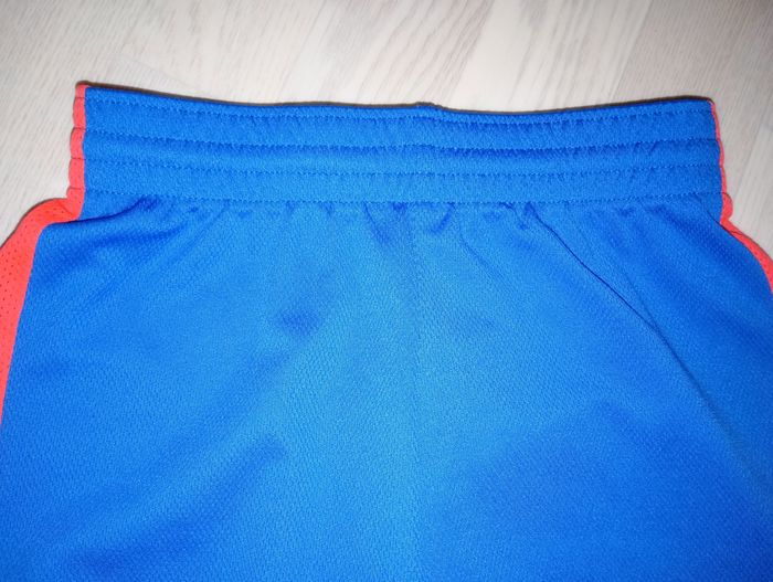 Short bleu et rouge Tarmak Decathlon 
T. 10 ans - photo numéro 2